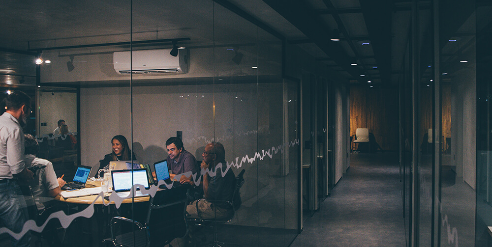 A web design meeting taking place in an office