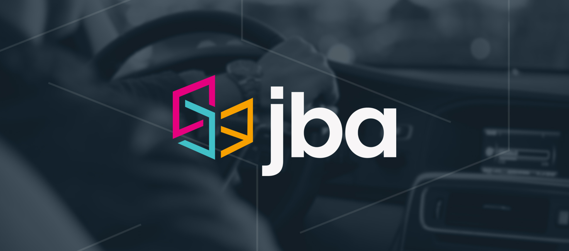 JBA Branded Image of someone driving a car