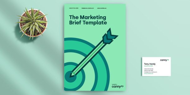 The Marketing Brief Template next to a business card